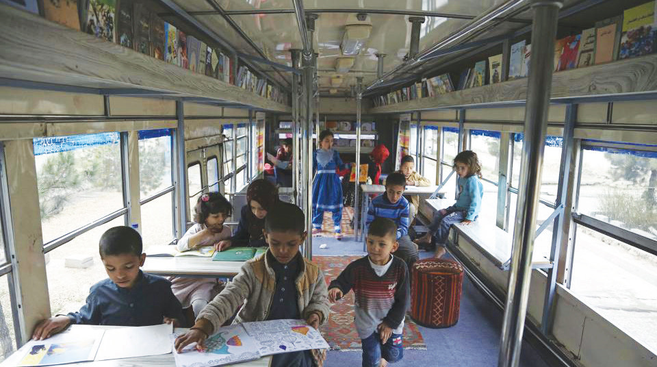 reading to Afghan children